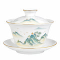 Tazza Gaiwan 150 ml in porcellana bianca con paesaggio blu e bordo dorato